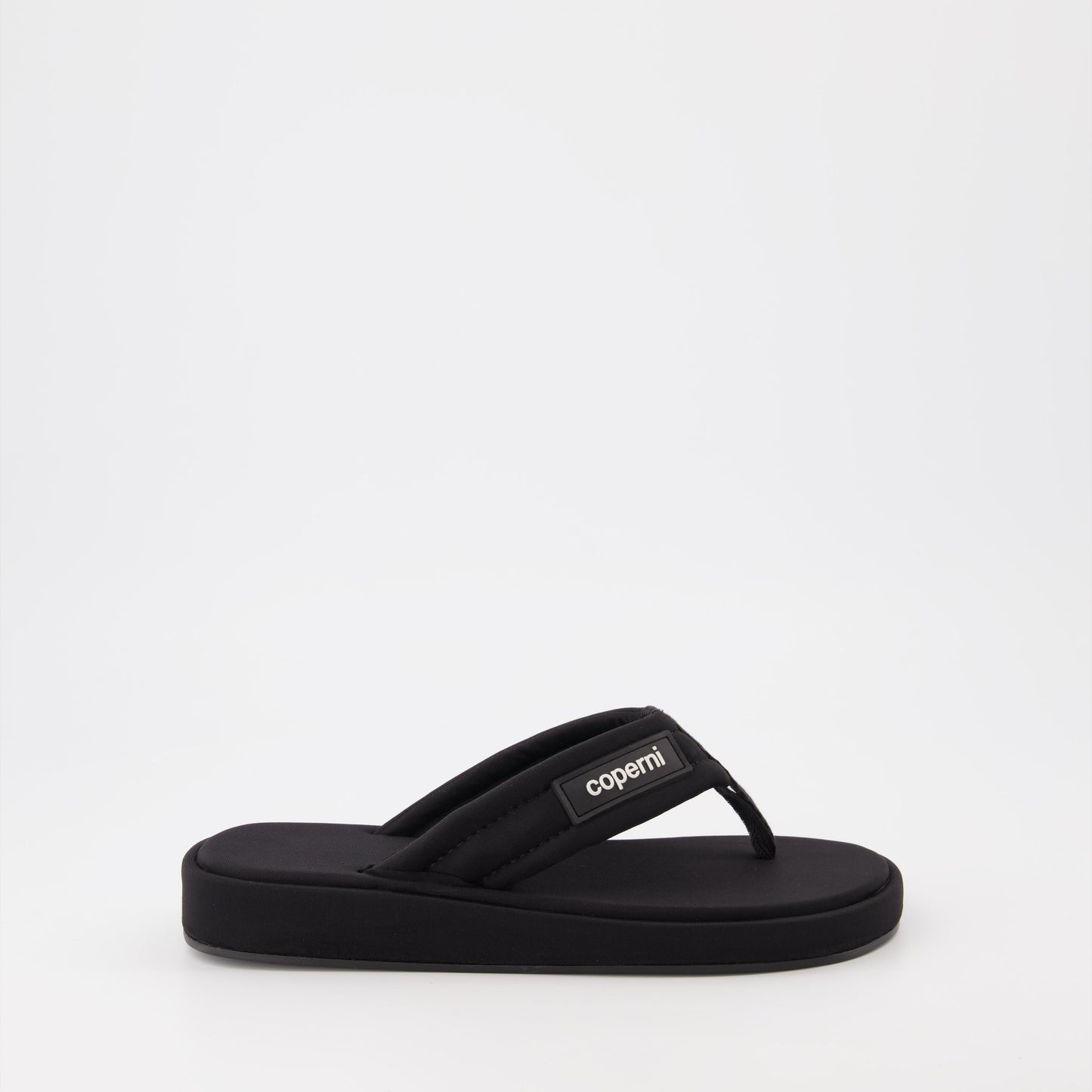 Coperni flip-flops, black logo sandals, luxury beachwear, stylish summer footwear, premium casual sandals