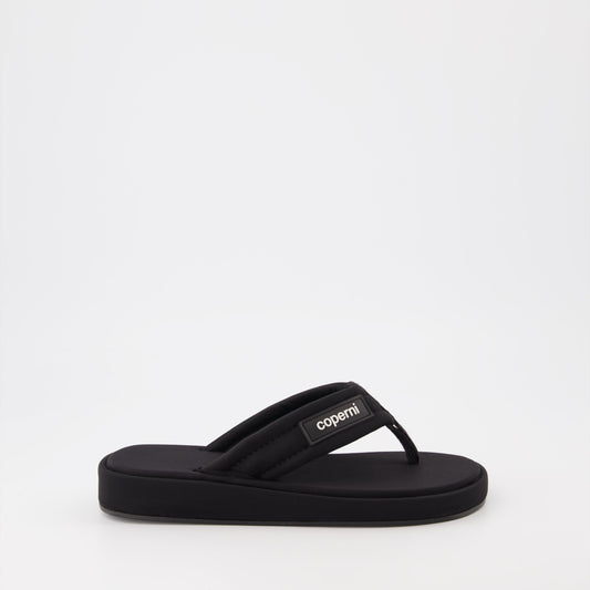 Coperni flip-flops, black logo sandals, luxury beachwear, stylish summer footwear, premium casual sandals