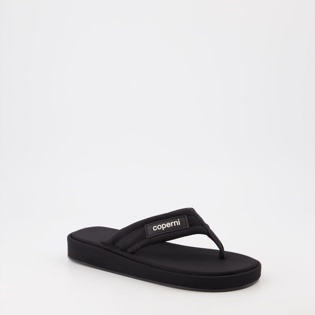 Coperni flip-flops, black logo sandals, luxury beachwear, stylish summer footwear, premium casual sandals