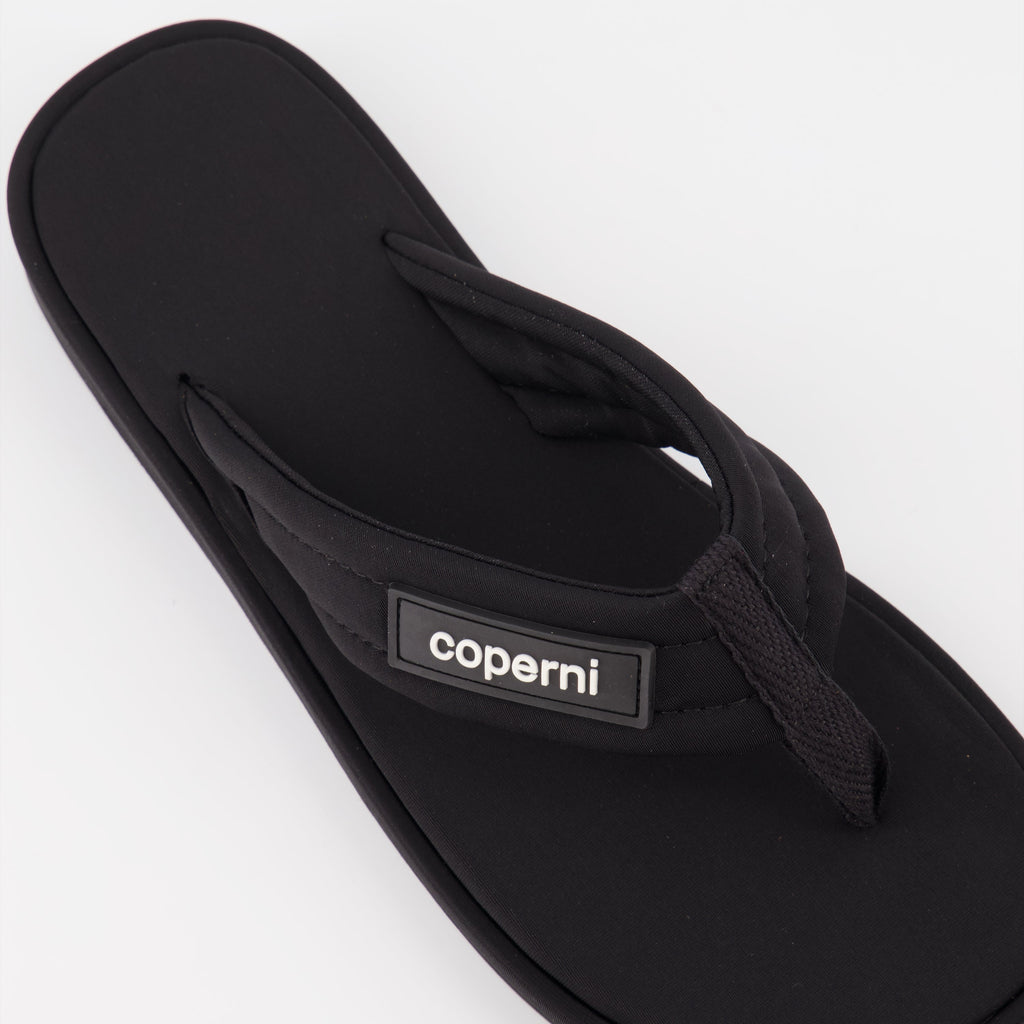 Coperni flip-flops, black logo sandals, luxury beachwear, stylish summer footwear, premium casual sandals