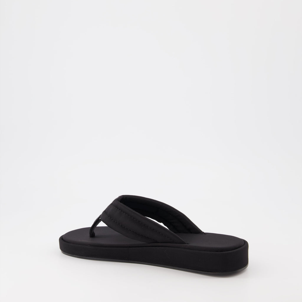 Coperni flip-flops, black logo sandals, luxury beachwear, stylish summer footwear, premium casual sandals