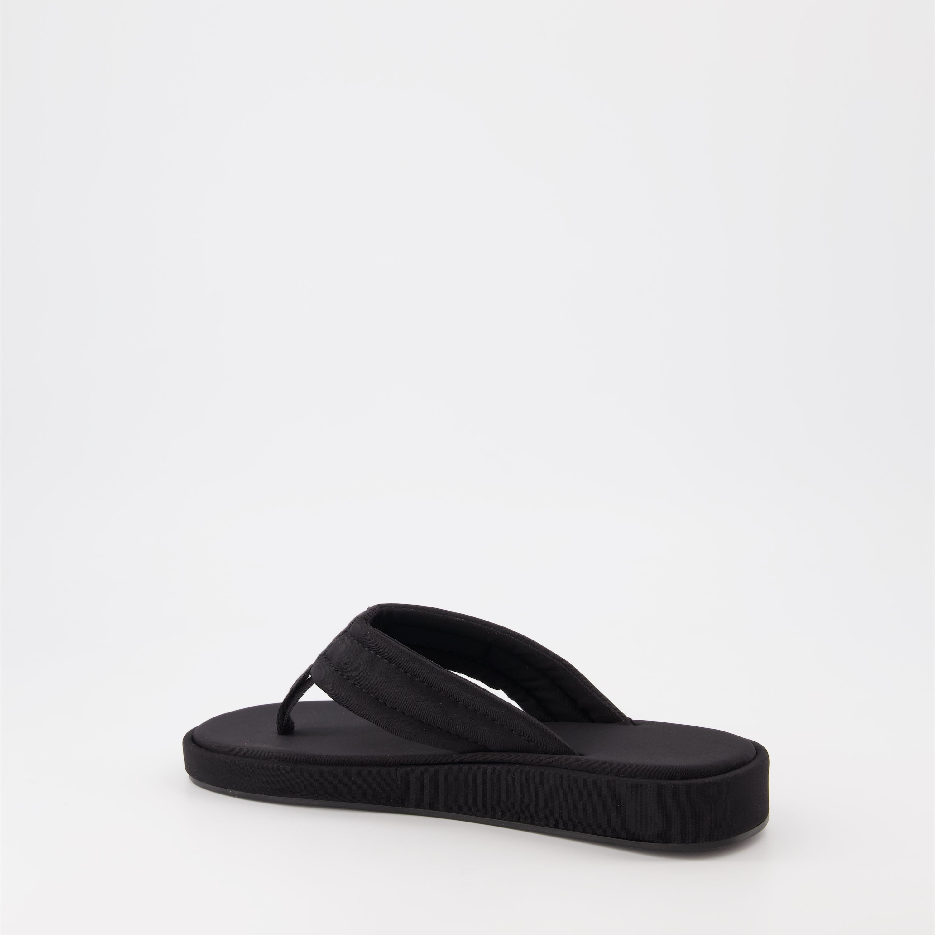 Coperni flip-flops, black logo sandals, luxury beachwear, stylish summer footwear, premium casual sandals