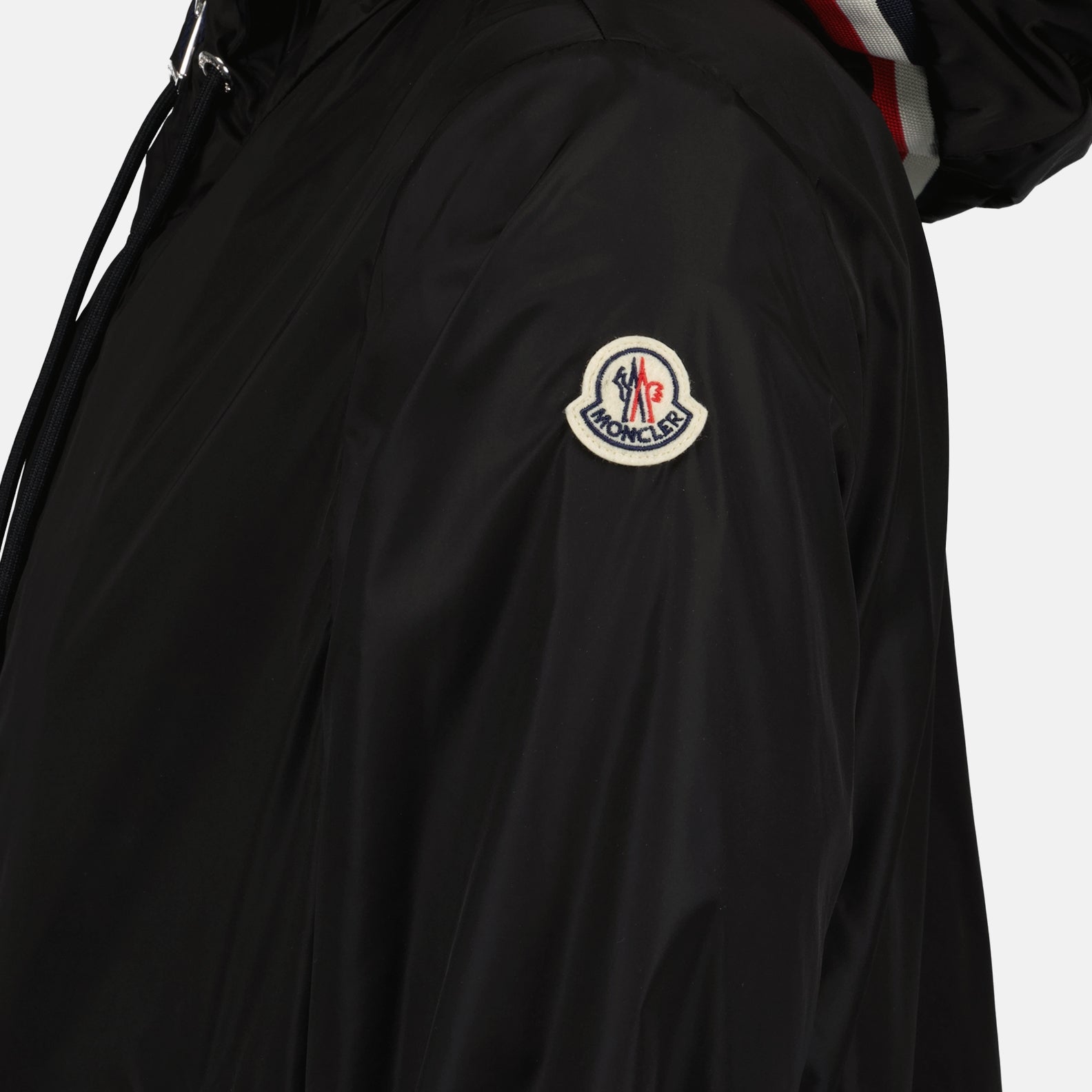 Moncler, black nylon jacket, men's luxury outerwear, sleek design, Grimpeurs jacket